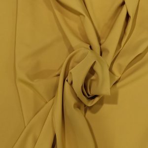 Tela bielástico color mostaza