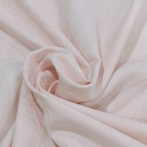 Tela de piqué jacquar en rosa